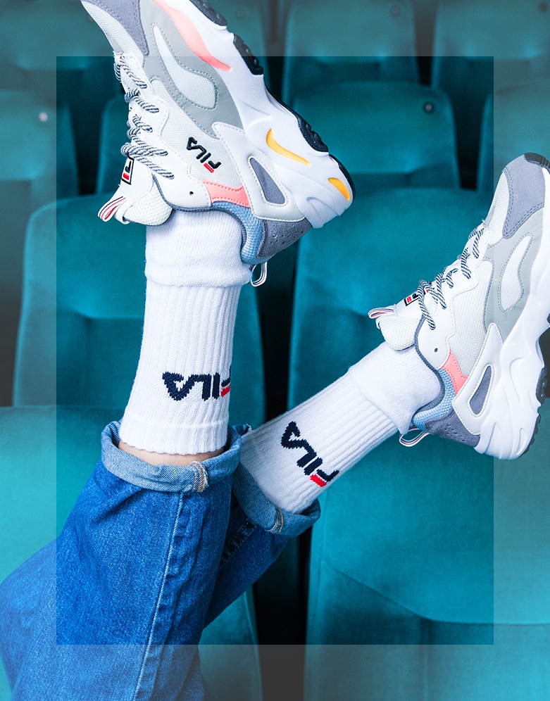Fila socks and shoes in a theater